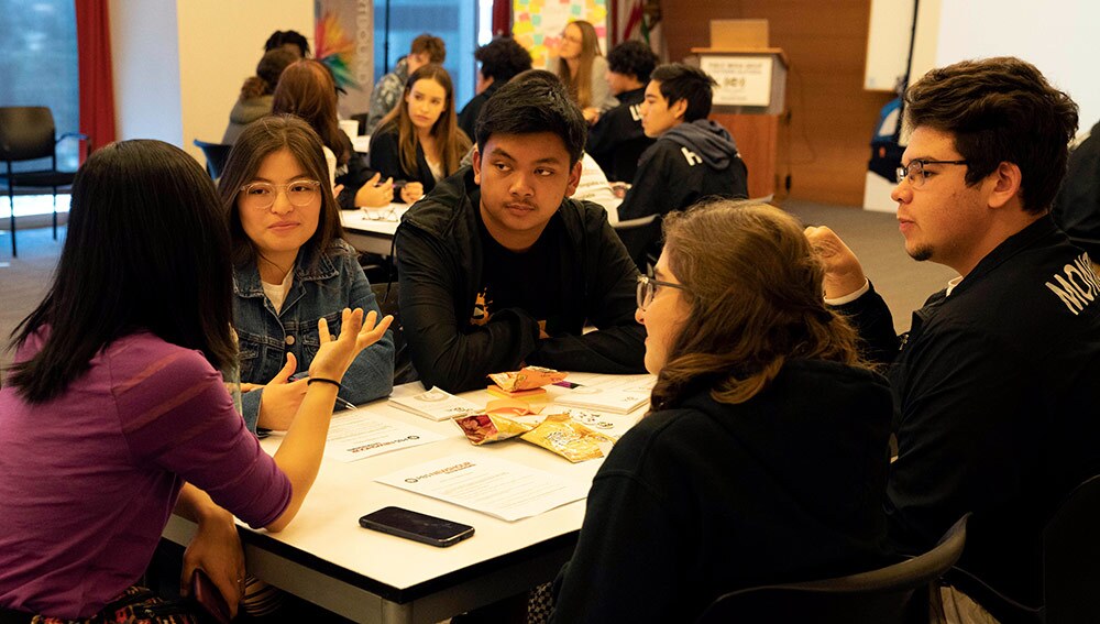Students share their pitch ideas with Carren Jao, a digital producer. | Carla Pineda