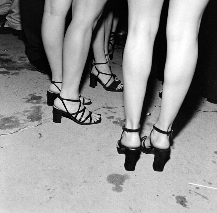 Girl's shoes & legs at party