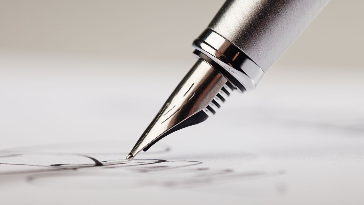 Fountain Pen Signing a Paper