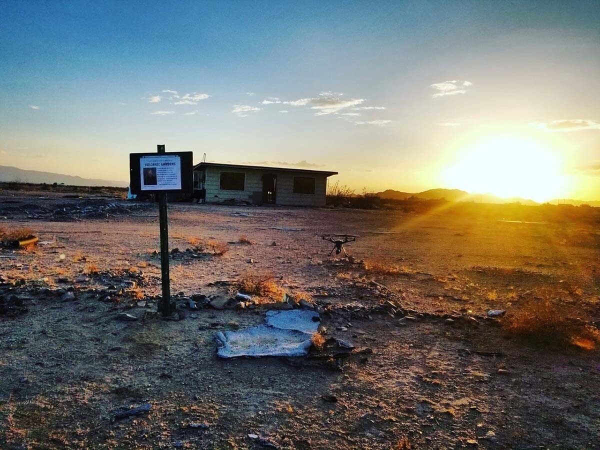 Hazel's abandoned homestead garden and a sign outside encouraging visitors to be more cautious and thoughtful about their presence. | Joe Barrett