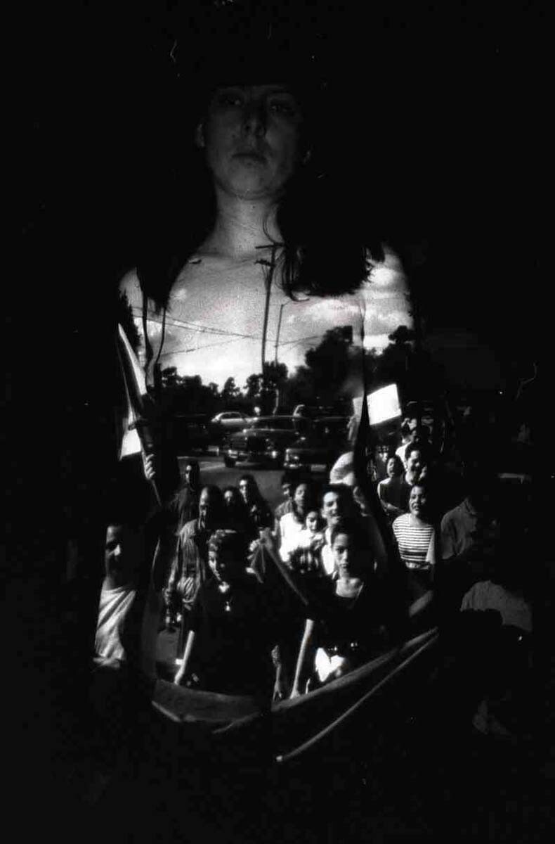 “Re-Membering: Viva Zapata March” (1994), performative self portrait, black and white photo, 1999 | Sandra de la Loza