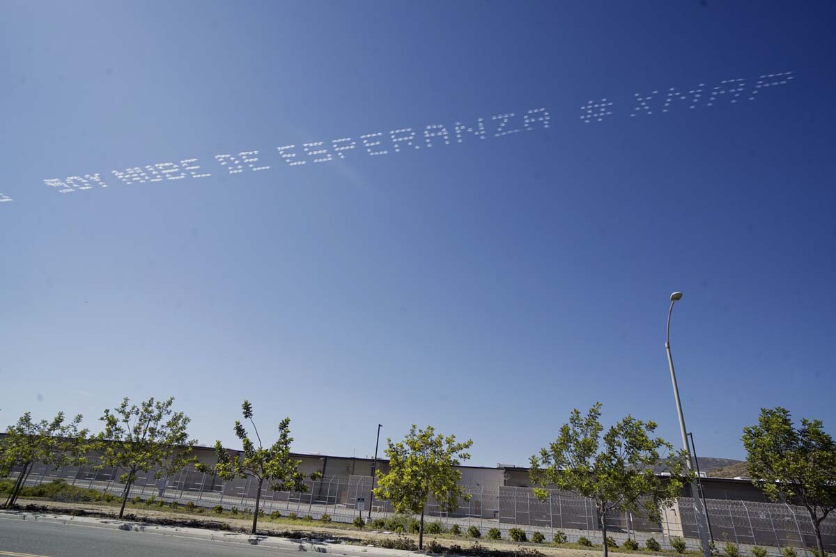 "SOY NUBE DE ESPERANZA #XMAP" written in in the sky, contributed by Marcos Erre Ramirez over the Cross Border Express | Sandy Huffaker, In Plain Sight