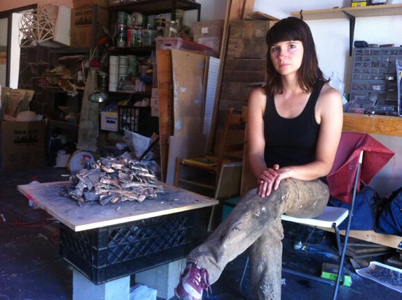 Liz Glynn in her studio with her ceramic copy (in progress) of the Salisbury Hoard | Photo: Sharon Mizota.
