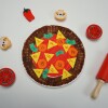 a pizza craft made of a paper plate made to look like a pizza using markers and construction paper shapes