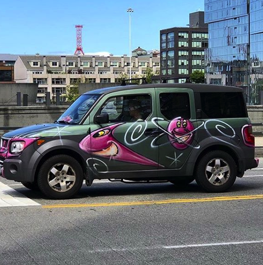 A green car bombed by Kenny Scharf for his "Karbombz!" project | Courtesy of the artist