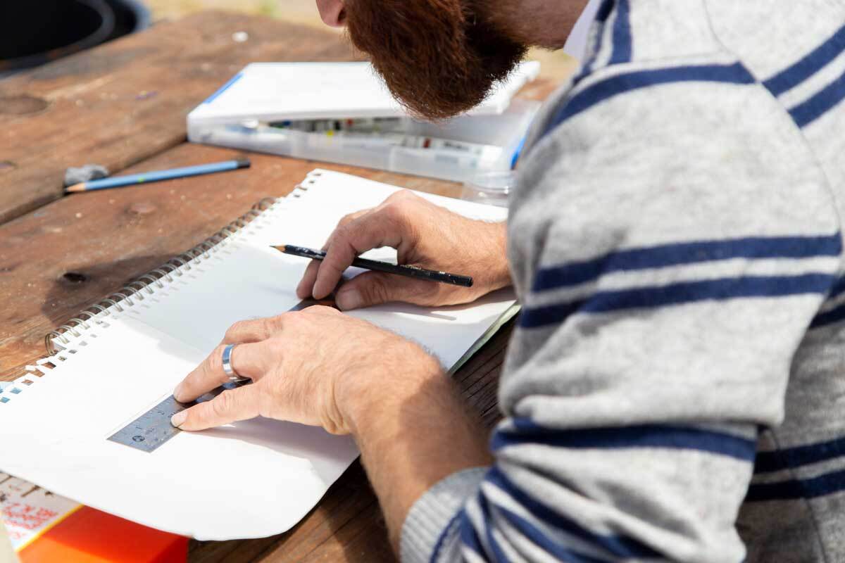 Nikko Mueller drawing at the San Clemente Border Station for "Three Border Ecologies" | Lena Martinez Miller