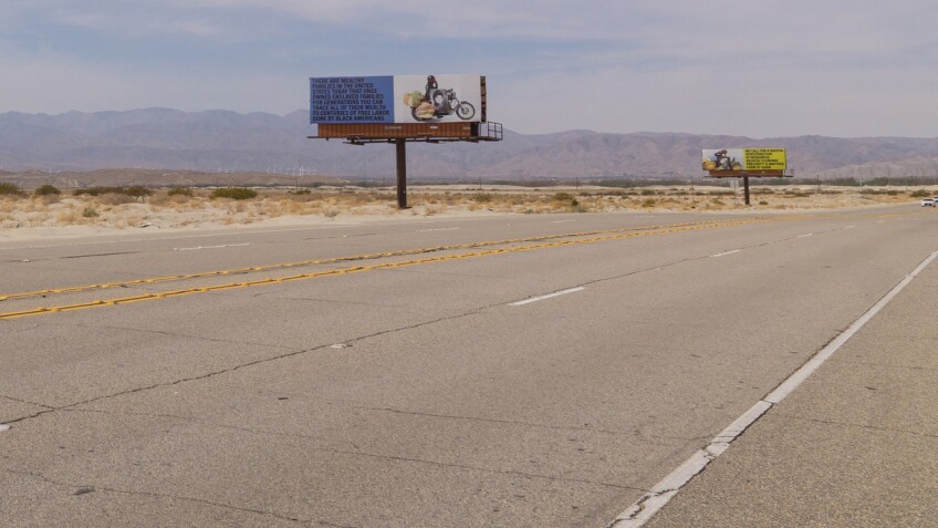 Xaviera Simmons' "Because You Know Ultimately We Will Band A Militia" is a series of billboards along Gene Autry Trail as part of Desert X 2021.