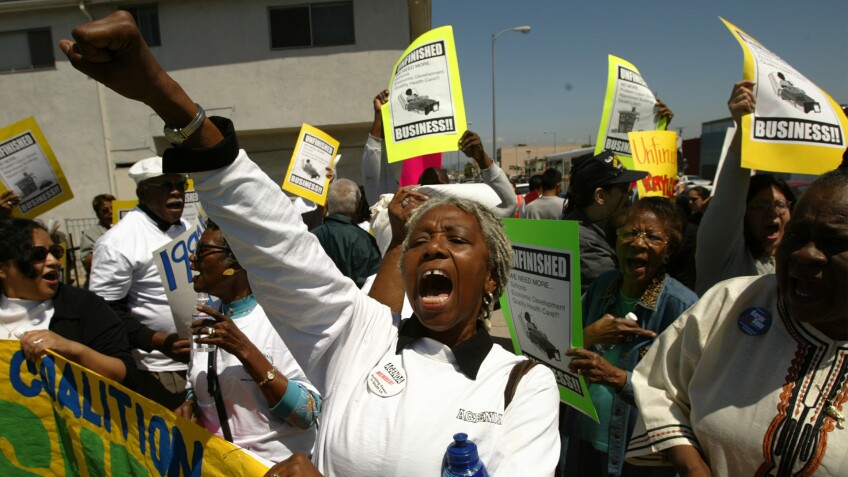 Community Coalition Protest - Banner