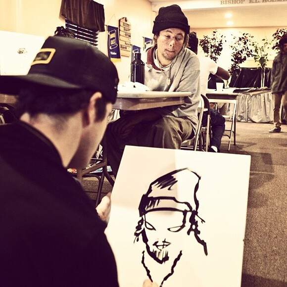 Artist Gregory Siff drawing SPY youth partner Chandler.