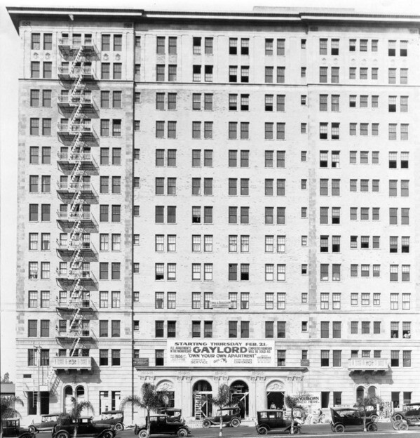Sign reads: ''Starting Thursday Feb. 21 all apartments in the magnificent Gaylord, completely furnished, will be sold as ''Own Your Own Apartment'''
