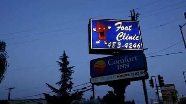 The HafoSafo Chorus and the Sunset Foot Clinic Sign Online