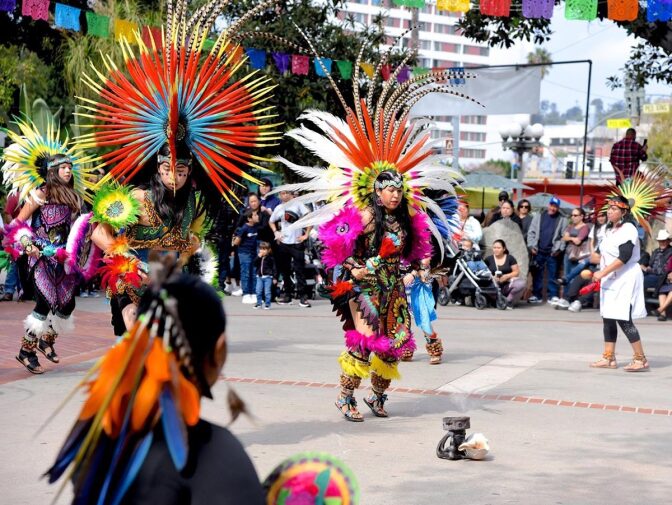 From left to right: Mayahuel and Ocelotl dance with their mother, Lupe Tellez. | Courtesy of Lupe Tellez