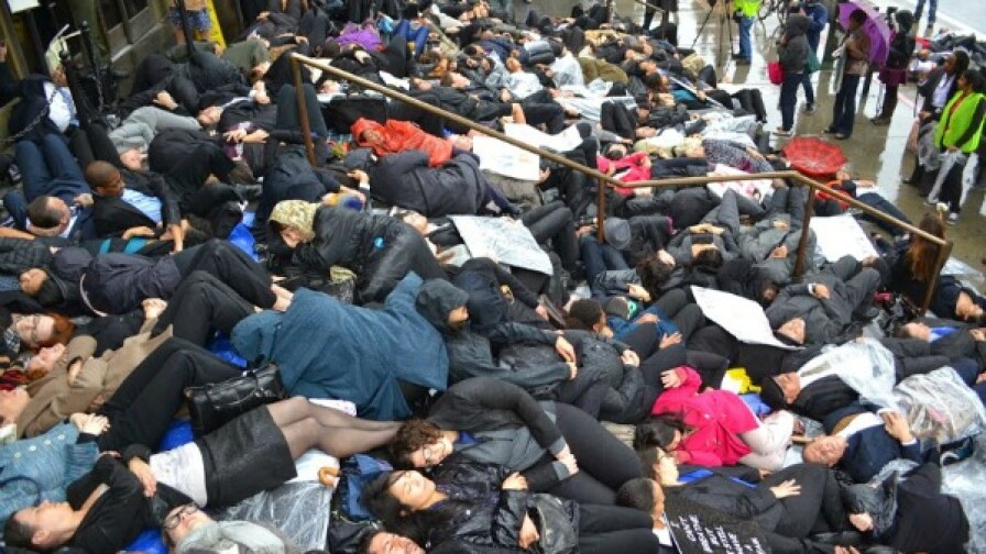Lawyers perform a die-in on the steps of the Stanley Mosk Courthouse in downtown Los Angeles. | Photo: Courtesy Josh Kamensky