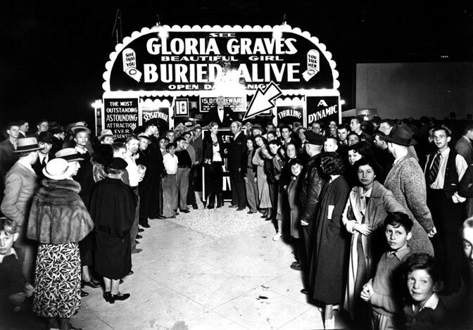 Mysterious Mr. Q. The arrow points out Robert Godwin (also known was Mr. Q) standing beside Gloria Graves at her burial site. Photograph courtesy of Herald-Examiner Collection, Los Angeles Public Library
