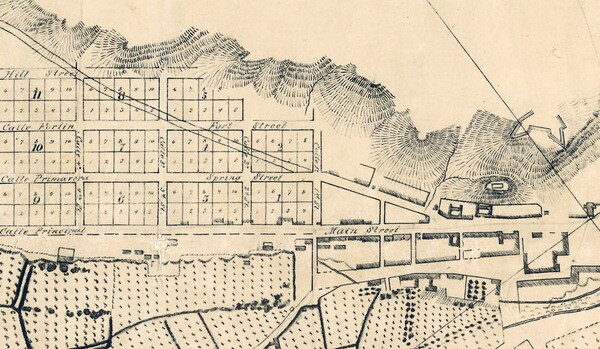 When E.O.C. Ord platted out Los Angeles' streets in 1849, he named one after an adobe fort (seen on the right) named Fort Moore. Detail of Ord's 1849 plan, courtesy of the Map Collection - Los Angeles Public Library.