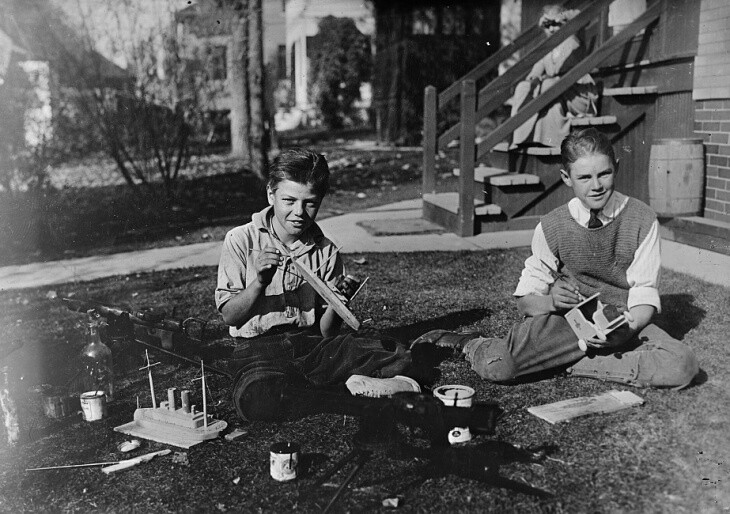 May 24, 1919: Children in Denver, Colorado play in their "backyard workshop" while schools are closed during the influenza epidemic of 1918 and 1919. | Courtesy Library of Congress