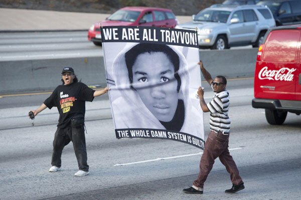 Protestors in Los Angeles, CA stop highway traffic following the acquittal of George Zimmerman on July 14, 2013. Photo by: ROBYN BECK/AFP/Getty Images