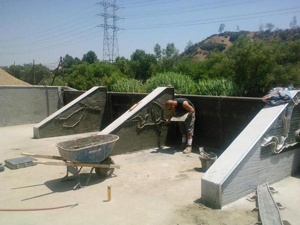 Installing the egrets | Photo courtesy of Robert Rossoff