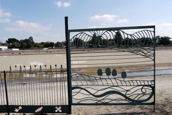 Decorative gates lead park visitors directly to the San Gabriel River and its bike paths | Photo: Yosuke Kitazawa.