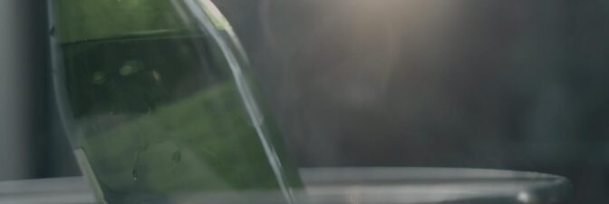 Green Sequoia Sake bottle | Still from "The Migrant Kitchen" Sequoia Sake MKs3