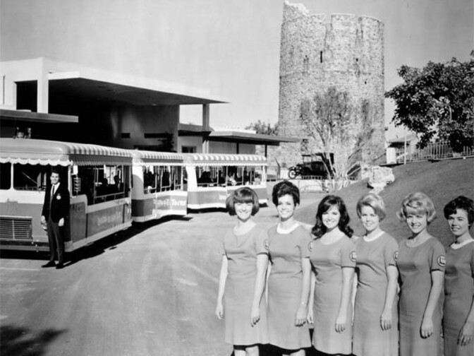The Universal City Studio Tour Guide Corps poses with the Glamortram | Los Angeles Herald Examiner Photo Collection/Los Angeles Public Library