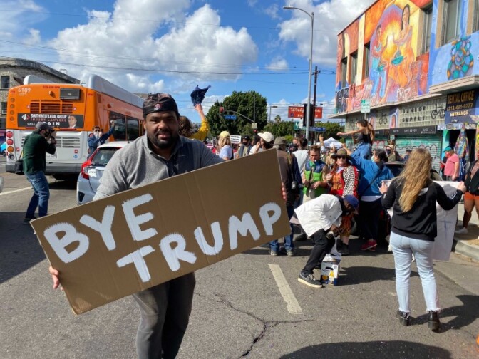 Angelenos celebrate Joe Biden's electoral college win over President Donald Trump in Echo Park on Saturday, Nov. 7, 2020. | Gina Pollack/LAist