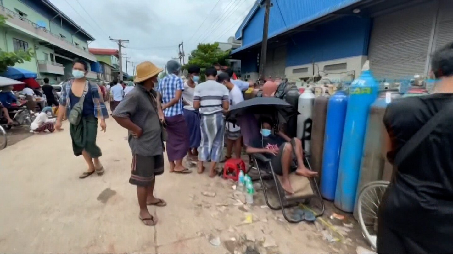 Civilians on a street in Myanmar.