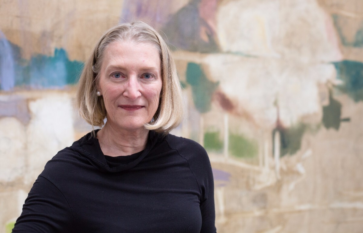 Sylvia Tidwell in front of an oil painting on linen she is currently working on. | Magali Gauthier Santa Fe Art Colony