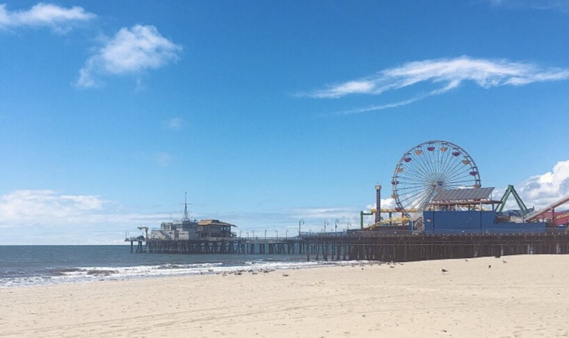 The view to Santa Monica pier on a very quiet beach on March 25. | Taylor Coffman/LAist