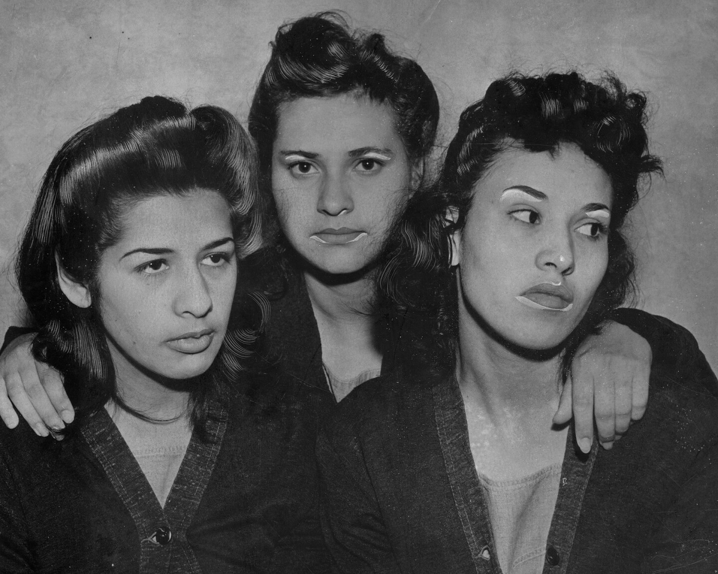Alba Barrios, Francis Silva, and Lorena Encinas, held in prison in connection with slaying during the Zoot suit period, 1942.