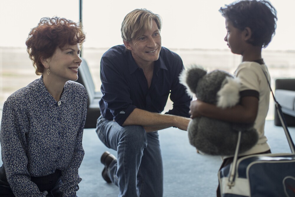 Nicole Kidman (as Sue Brierley), David Wenham (as John Brierley) and Sunny Pawar (as a young Saroo Bierley) in the film "Lion."
