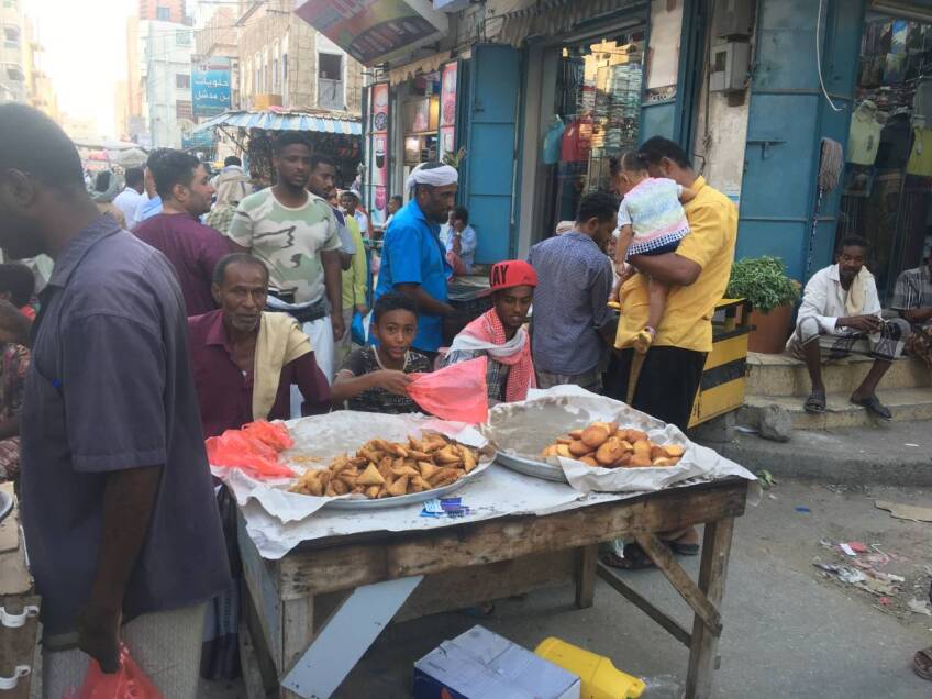 Vendors sell food at the Sharej street market in Mukalla, Yemen, April 26, 2020. | Thomson Reuters Foundation/Saeed Al-Batati