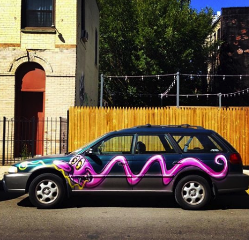 A blue station wagon bombed by Kenny Scharf for his "Karbombz!" project | Courtesy of the artist