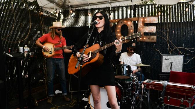 Blue Rose Rounders performing on the back porch at the Grand Ole Echo | Katie Stratton