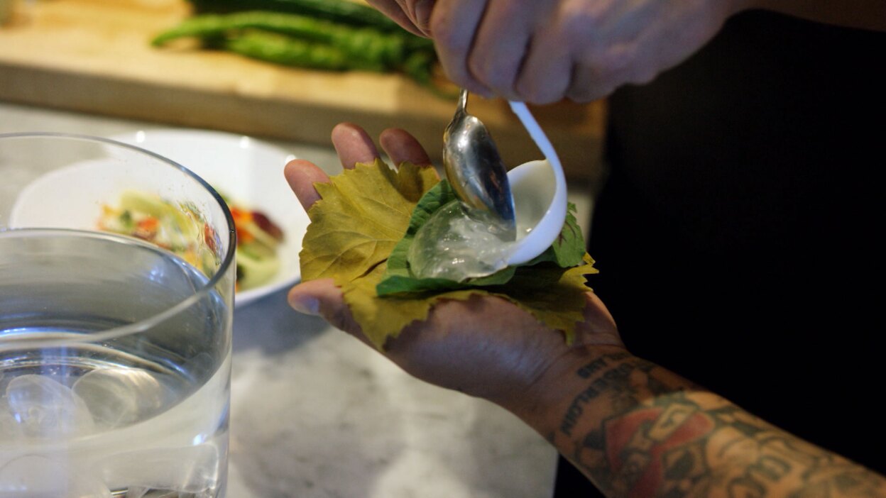 Jellyfish dish by Hank and Bean held by Roy Choi | Still from "Broken Bread"