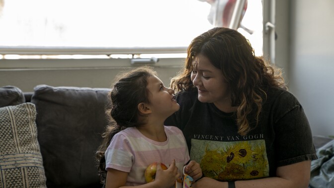 Family Math Patterns- A mom and child look happily into each other's eyes
