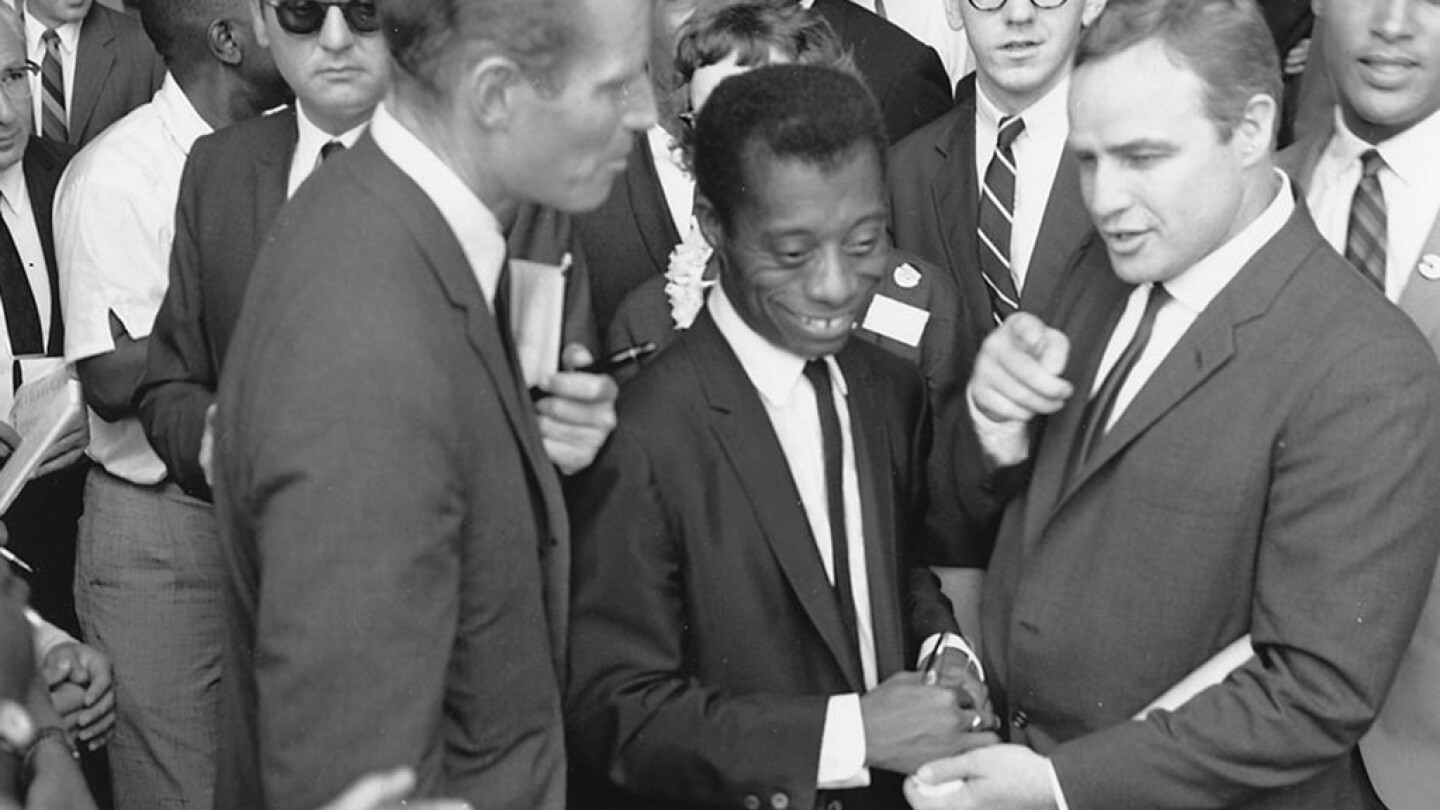 L-R Charlton Heston, James Baldwin, and Marlon Brando at the March on Washington