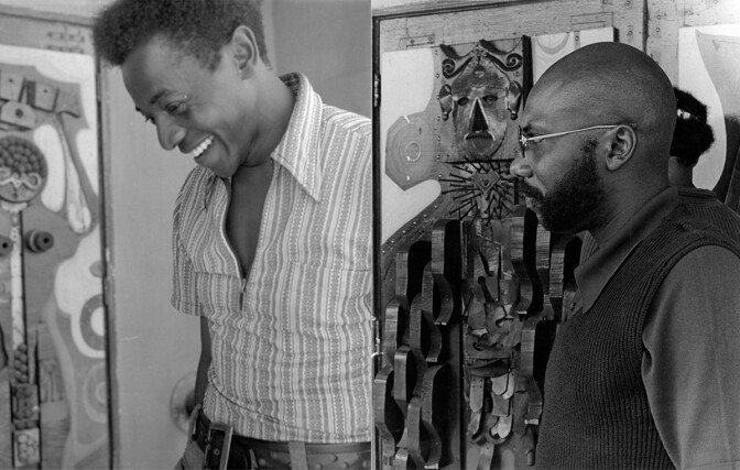 Elliott Pinkney and John Outterbridge stand at The Arena's doors, which are decorated with assemblage art made of iron, wood, and other materials. | Courtesy of Willie Ford, Jr. and the Compton Communicative Arts Academy Collection, Special Collections and Archives, John F. Kennedy Memorial Library, California State University, Los Angeles