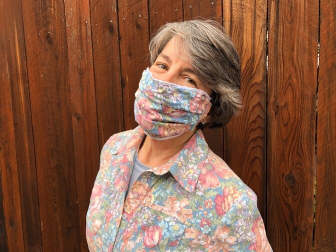 Sharon McNary in a mask she made to match her shirt. | Sharon McNary/LAist