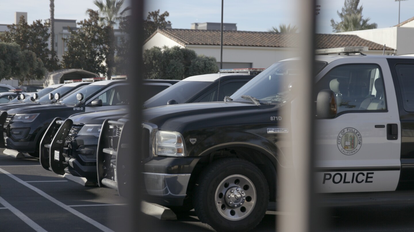 City of Fullerton police cars in a parking lot | Still from SoCal Connected's "The Fight to Know"