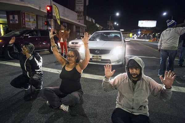 Bringing the city to a standstill, demonstrators speak out against the slew of killings of young Black men and women. November 24, 2014 in Los Angeles, Calfornia. Photo by: RINGO CHIU/AFP/Getty Images