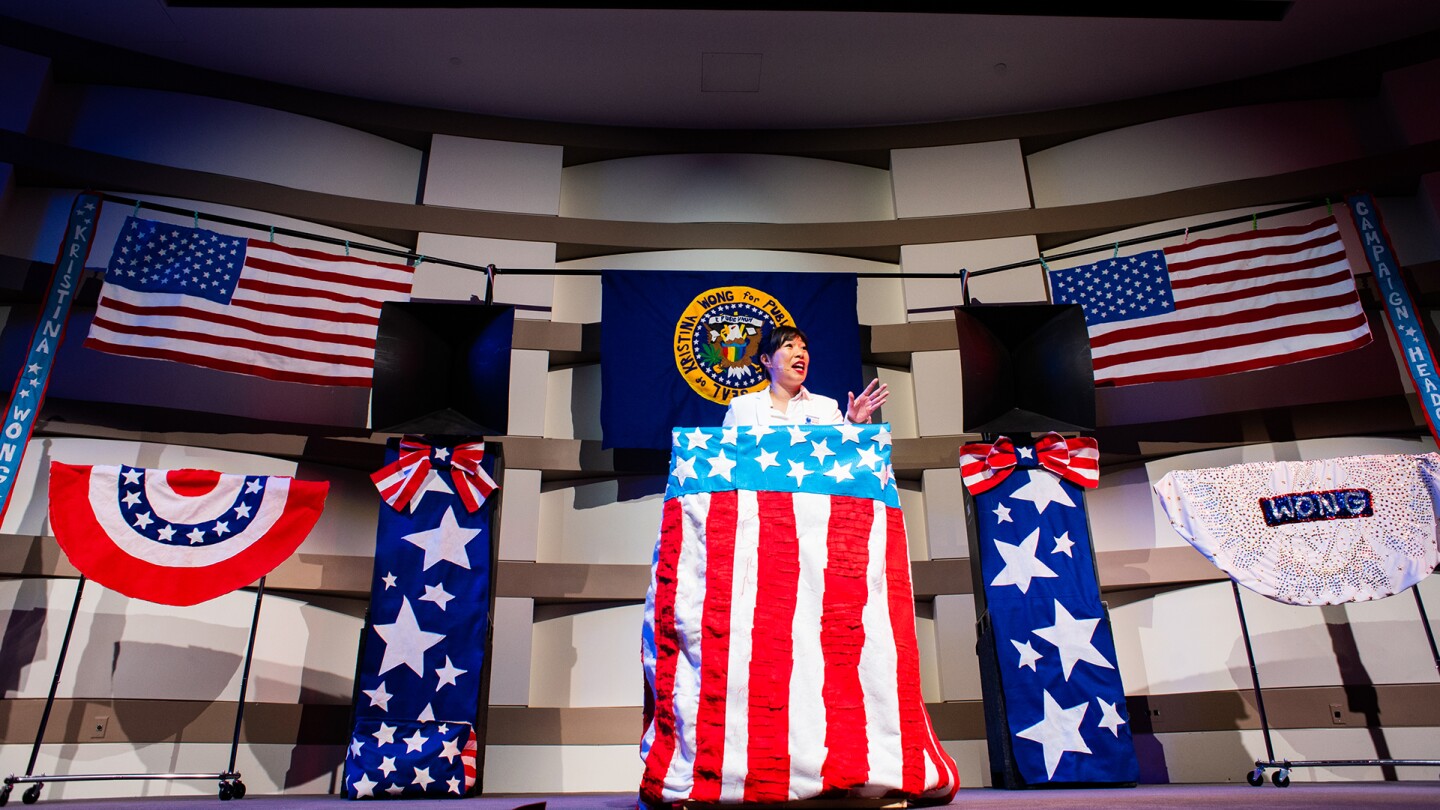 "Kristina Wong for Public Office" showcases an entire campaign rally set, including an American flag and presidential seal, are sewn | Courtesy of Kristina Wong