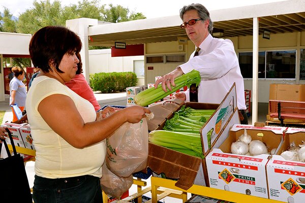 Hidden Harvest is operated by only four staff members and relies on volunteers for much of its distribution at events.I Photo by: Christy Porter