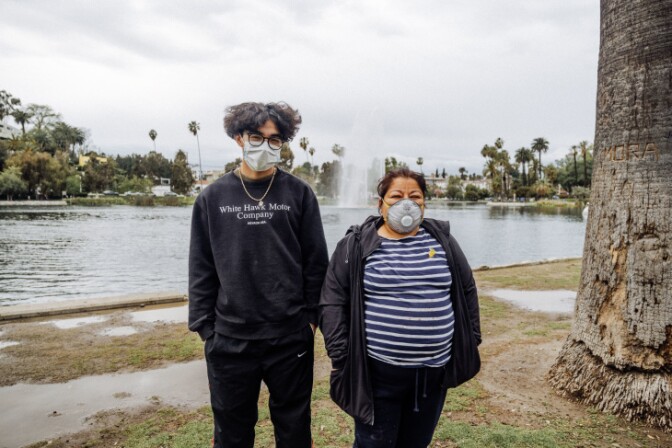 Paul and Elsa Santos no longer greet most people because of their fear of catching COVID-19. | Chava Sanchez/LAist