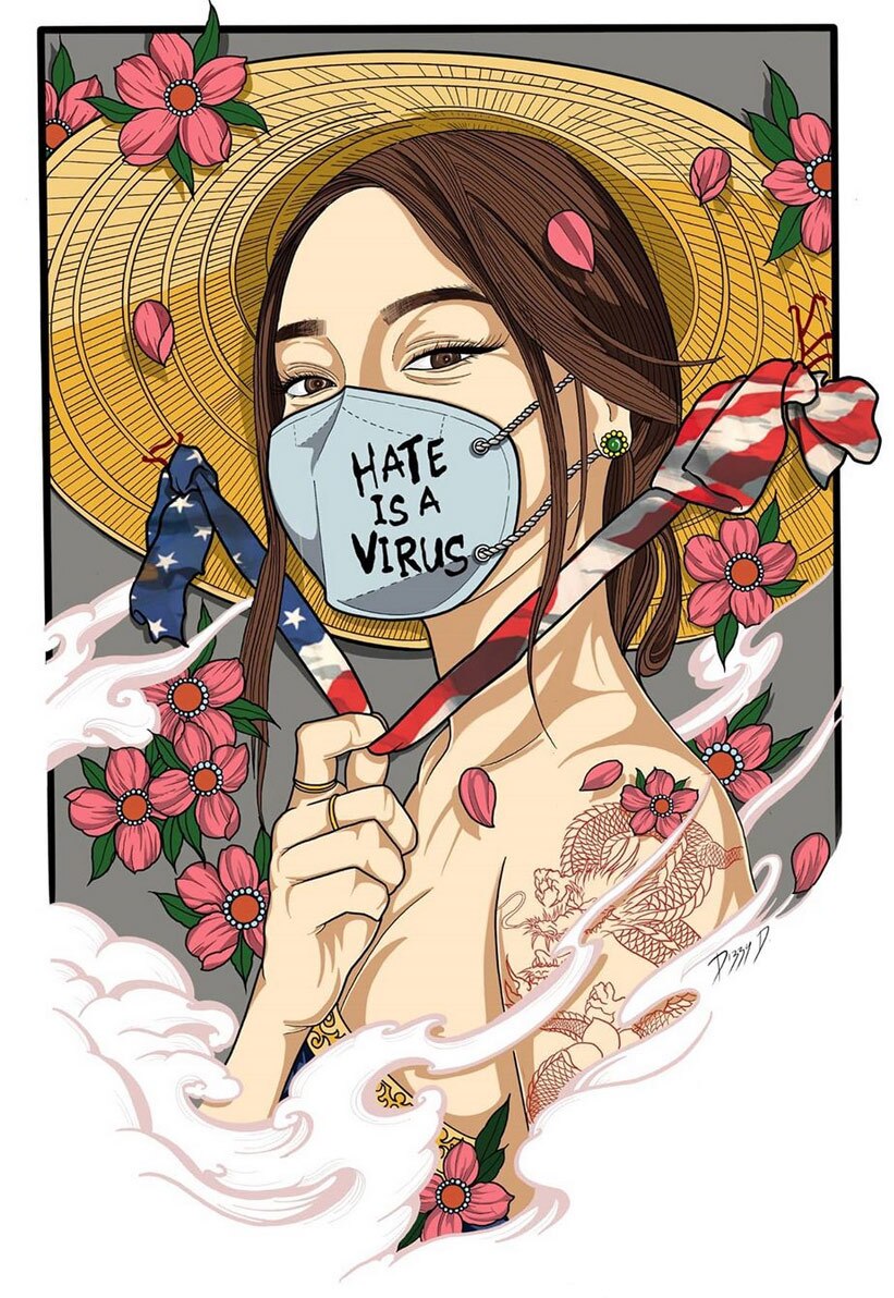 A Vietnamese-American woman wears a Vietnamese non la hat and a face mask that says, "Hate is a virus."