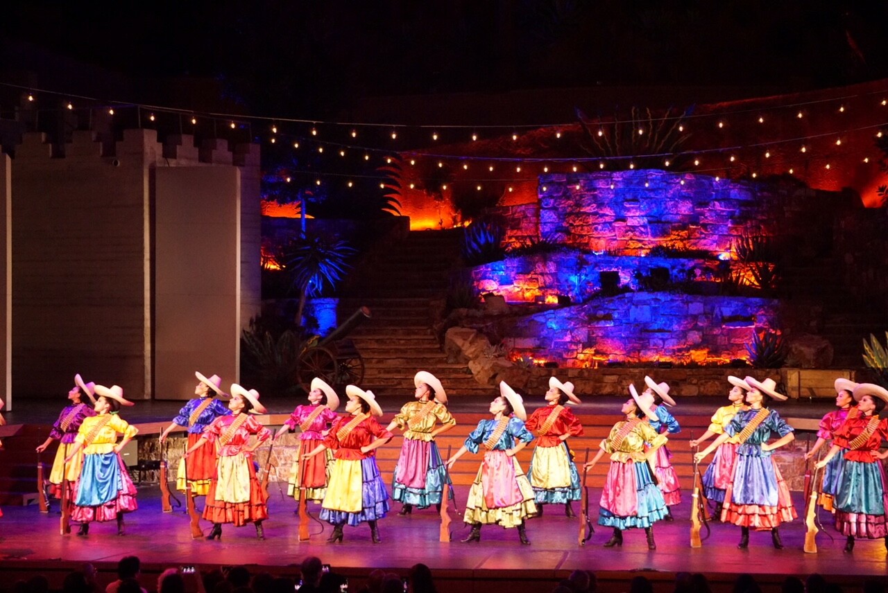 "La Adelita" performed by Pacifico Dance Company showcases the role of women int he Mexican Revolution. Female dancers with sombreros and and guns stand proudly in formation. | Courtesy of Pacifico Dance Company