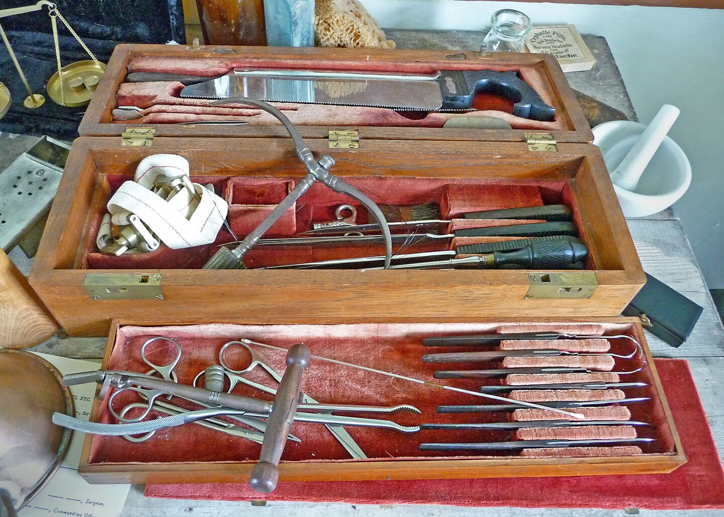 Frontier Medicine, 1865. Bone saw, tourniquet, scalpels, and other implements were standard equipment in a mid-century medical kit. Photograph courtesy of Wikimedia.