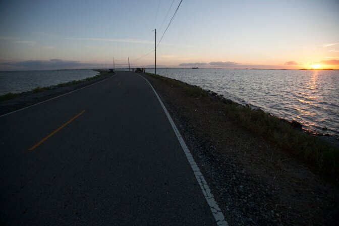 The only road connecting Isle de Jean Charles to the rest of Louisiana. | Nicky Milne/Thomson Reuters Foundation