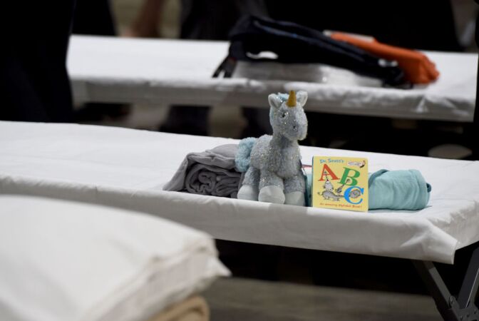 Sleeping quarters set up inside the Long Beach Convention Center on April 22, 2021 in in Long Beach, California.