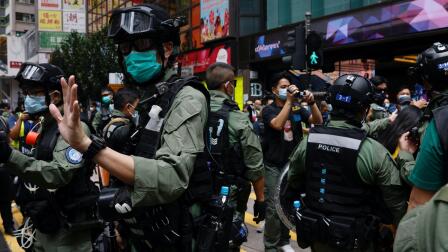 News Wrap: Hong Kong police arrest at least 60 protesters